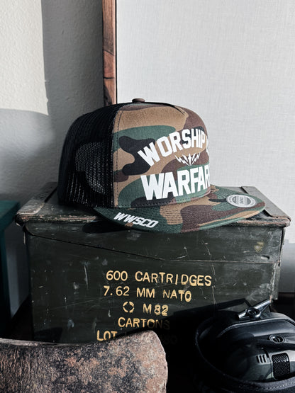 WORSHIP IS WARFARE CAMO SNAPBACK HAT [SMALL BATCH]