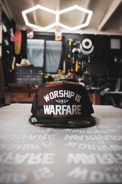 WORSHIP IS WARFARE CAMO SNAPBACK HAT [SMALL BATCH]