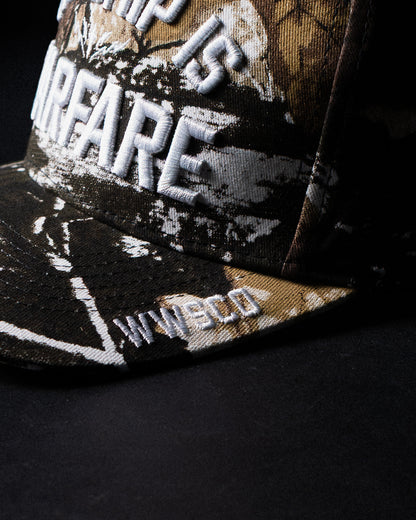 [NEW] "WORSHIP IS WARFARE" TREE CAMO HAT (LIMITED BATCH 001)